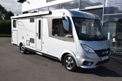 Front view of HYMER Exsis-I 678 parked outside Travelworld motorhomes showroom in Stafford