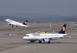 Aircraft waiting on a runway at the airport