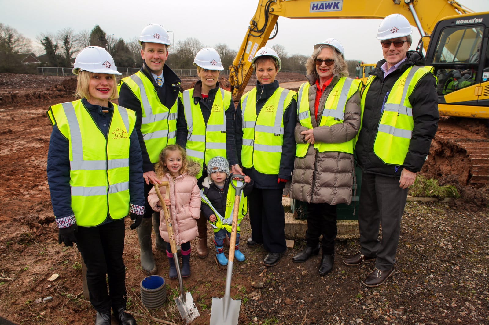 Turf cutting by The Edwards family at the site of Travelworld