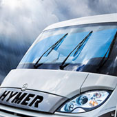 hymer motorhome with dark clouds