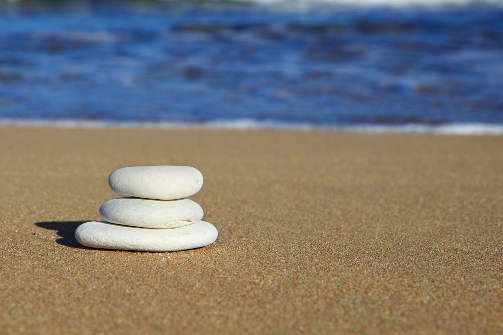 rocks stacked on the beach