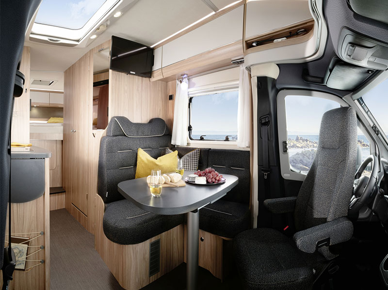 HYMER ML-T 560 lounge table and cockpit view