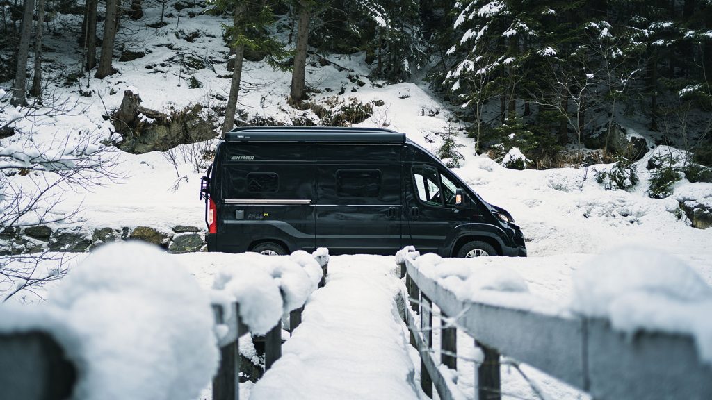 Driving in bad weather - Camper Van Free 540 parked in the snow