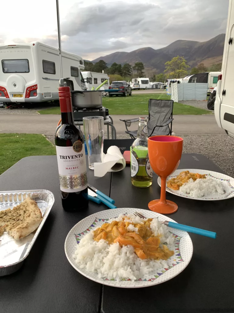 Enjoying some food and drink outside their HYMER