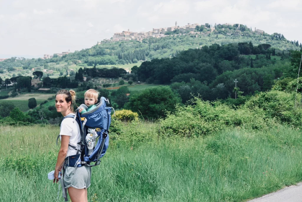 Woman hiking with baby in carrier